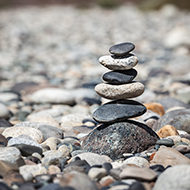 Zen balanced stones representing balance, peace, and serenity.